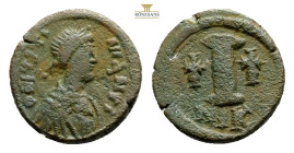 Justinian I (?), AD 527-565. AE, Decanummium. 4,3 g. 17.2 mm. Nicomedia.Obv: Pearl diademed, draped, cuirassed bust right.Rev: Large I, cross to right...