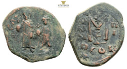 Heraclius, with Heraclius Constantine. Follis. Año 4 = 613/614 d.C. Constantinople. Crowned and draped figures of Heraclius and Heraclius Constantine ...