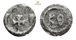 Byzantine lead seal
Obverse face is a cross within a crescent moire. Reverse face is K-O within a circle. 0,97 g. 11,4 mm.