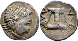 LOWER DANUBE. Uncertain tribe. Circa 4th-3rd centuries BC. Tetradrachm (Silver, 25 mm, 12.93 g, 1 h), imitating Damastion. Celticized laureate head of...