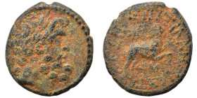 SYRIA, Seleucis and Pieria. Antioch. Pseudo-autonomous issue, time of Augustus, 27 BC-14 AD. Ae (bronze, 7.12 g, 21 mm), 13/14 AD. Laureate head of Ze...