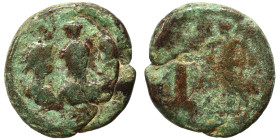 PALMYRENE. Palmyra. Pseudo-autonomous issue, circa 1st-3rd centuries AD. Ae (bronze, 2.27 g, 15 mm). Facing draped bust of Baal, wearing polos, betwee...