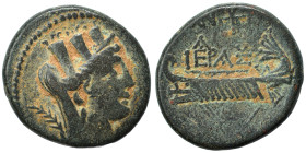 PHOENICIA. Tyre. Time of Vespasian, 69-79. Ae (bronze, 7.11 g, 22 mm). Turreted and veiled head of Tyche right, palm branch behind. Rev. (date) and mo...