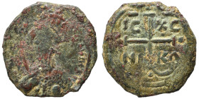 CRUSADERS. Principality of Antioch. Tancred, regent, 1101-1112. Follis (bronze, 3.93 g, 21 mm). Armored, bearded bust of Tancred facing, holding uprai...
