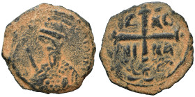 CRUSADERS. Principality of Antioch. Tancred, regent, 1101-1112. Follis (bronze, 3.13 g, 20 mm). Armored, bearded bust of Tancred facing, holding uprai...
