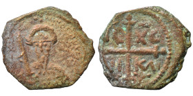 CRUSADERS. Principality of Antioch. Tancred, regent, 1101-1112. Follis (bronze, 2.89 g, 19 mm). Armored, bearded bust of Tancred facing, holding uprai...