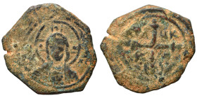 CRUSADERS. Principality of Antioch. Tancred, regent, 1101-1112. Follis (bronze, 5.73 g, 24 mm). Nimbate bust of Christ facing, holding book of Gospels...