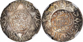 MOROCCO. 2-1/2 Dirhams, AH 1299 (1882). NGC MS-65.

KM-Y6; Lec-132. Fully lustrous with iridescent toning in the fields that nicely brings out the d...