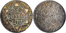 MOROCCO. 1/4 Rial, AH 1321 (1903/4). London Mint. PCGS MS-64 Gold Shield.

KM-Y20.2; Lec-150; Gad-45. Lustrous with stunning dark colorful toning an...