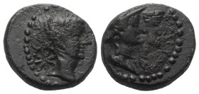 Pamphylien. Magydos. Tiberius (14 - 37 n. Chr.).

 Bronze.
Vs: Kopf mit Lorbeerkranz rechts; im Feld links runder Gegenstempel mit Stern.
Rs: Zwei...