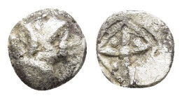 ASIA MINOR. Uncertain. (5th century BC).Hemiobol.

Obv : Head of Athena right, wearing corinthian helmet.

Rev : Star within incuse square. 

Conditio...