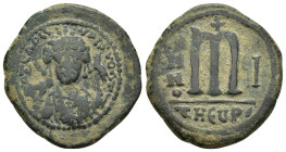 MAURICE TIBERIUS.(582-602).Antioch.Follis.

Obv : Crowned facing bust, wearing consular robe, holding mappa and eagle-tipped sceptre.

Rev : Large m b...