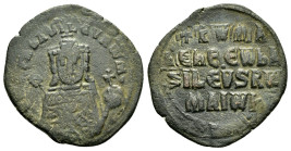 CONSTANTINE VII with ROMANUS I.(913-959).Constantinople.Follis.

Obv : + RωMAҺ ЬASILЄVS RωM.
Crowned facing bust of Romanus, holding globus cruciger a...