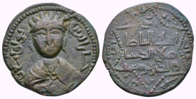 ARTUQID of MARDIN.Husam al-Din Yuluq Arslan.(1184-1200).AH 582.Dirhem.

Obv : Diademed and draped facing bust, with hand across chest; legend around.
...
