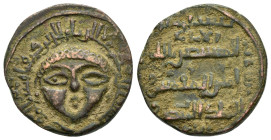 ARTUQIDS of MARDIN.Artuq Arslan.1201-1239 AD.No Mint. 623 AH.AE Dirham.

Obv : Draped facing male solar bust; name and title of Seljuq of Rum overlord...
