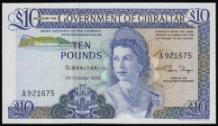 Gibraltar 10 Pounds Pick 22b dated 21st October 1986 Coat of Arms to lower centre left and Queen Elizabeth II at right and as watermark. The reverse w...