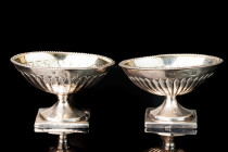 A pair of elegant footed salt cellars. Silver 84, Moscow, Russian Empire. The size: 5,1 height x8,4x6,2 cm. Total weight 106 gr. Manufacturer mark F.S...