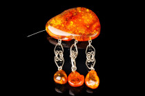 Beautiful brooch with Baltic amber and three pendants. Metal melchior. Vintage Latvia. Weight 19 gr
Excellent
