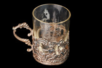 Europe. Carved cup holder with cupids. European silver 19th century. Antique glass cup, set. Height 3 cm and weight 12 gr
Used