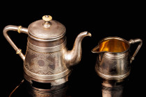 Silver Teapot and Cream Jug. Russian style with chiseled decoration and gilding interior. Marked silver 84. Moscow, Russian Empire. The Teapot: 1888 y...