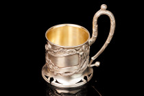 Shaped tea cup holder with iris flowers. Excellent condition. Early 20th century. Silver 84. Manufacturer mark V.А. The reign of Nicholas II. Height 1...
