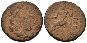 CILICIA. Tarsos (164-27 BC). Filleted club; monogram to left and right; all within oak wreath.TAPCЄΩN.
Zeus seated left on throne, holding crowning N...