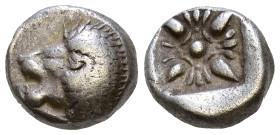 Ionia. Miletos circa 525-475 BC. Obol AR Forepart of lion to right, his head turned back to left / Star-shaped floral ornament within incuse square. A...