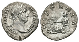 IMPERIO ROMANO. ADRIANO. Denario. Roma (130-133). A/ Cabeza laureada a der.; HADRIANVS AVG COS III P P. R/ Hispania recostada a izq. con rama y conejo...
