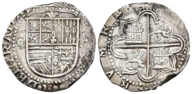 FELIPE II. 4 reales. S/F. Sevilla. "D cuadrada" en rev. Flor de lis entre el escudo y la corona. AR 13,67 g. 30,7 mm. AC-576. Leves oxidaciones. MBC+.