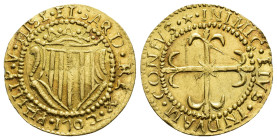 FELIPE V. Escudo. 1702. Cagliari. AU 3,21 g. 22,1 mm. Vti.-49. Golpecito en anv. y rebaba en rev. B.O. EBC+.