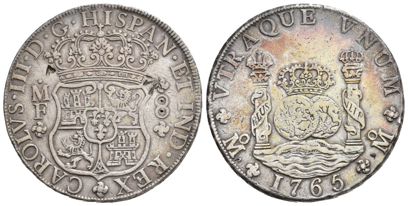 CARLOS III. 8 reales. 1765. México. MF. AR 27,09 g. 38,1 mm. VI-923. Dos resello...