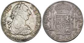 CARLOS III. 8 reales. 1786. México. FM. AR 26,9 g. 38,4 mm. VI-951. Golpe en canto y pequeñas marcas. MBC.
