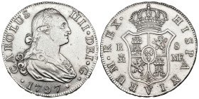 CARLOS IV. 8 reales. 1797. Madrid. FM. AR 27,11 g. 39,8 mm. VI-774. Limpiada. MBC+/EBC-. Escasa.
