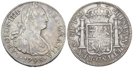 CARLOS IV. 8 reales. 1795. México. FM. AR 26,9 g. 39,2 mm. VI-791. Pequeñas marcas. MBC.