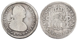 CARLOS IV. Real. 1799. Santiago. DA. AR 2,96 g. 20,08 mm. VI-431. Pequeñas marcas. BC+.