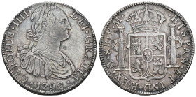 CARLOS IV. 8 reales. 1792. México. FM. AR 26,88 g. 38,8 mm. VI-788. Golpecitos en canto y anv. y finas rayas. MBC.