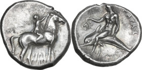 Greek Italy. Southern Apulia, Tarentum. AR Nomos, c. 302-290 BC. Philiarchos, Sa-, and Aga-, magistrates. Obv. Youth on horseback right, crowning hors...