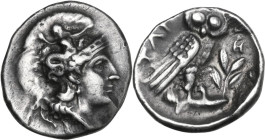 Greek Italy. Southern Apulia, Tarentum. AR Drachm, c. 302-280 BC. Obv. Head of Athena right, wearing helmet decorated with Scylla. Rev. TAP. Owl stand...