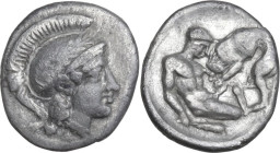 Greek Italy. Southern Apulia, Tarentum. AR Diobol, c. 325-280 BC. Obv. Head of Athena right, wearing crested helmet decorated with laurel-wreath. Rev....