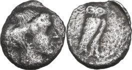 Greek Italy. Northern Lucania, Velia. AR Drachm, c. 465 - c. 440 BC. Obv. Head of nymph right. Rev. [ΥΕΛΗ]. Owl right, wings closed, perched on olive-...