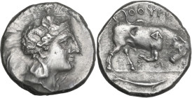 Greek Italy. Southern Lucania, Thurium. AR Didrachm, c. 400-350 BC. Obv. Helmeted head of Athena right, helmet decorated with Skylla holding trident. ...