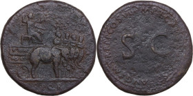 Vespasian (Divus, died 79). AE Sestertius. Struck under Titus. Obv. DIV[O] / AVG / VES[-]. Deified Vespasian seated right, holding sceptre and Victory...