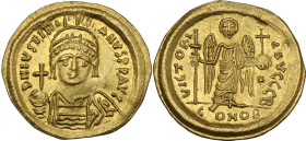 Justinian I (527-565). AV Solidus. Constantinople mint, c. 545-565 AD. Obv. DN IVSTINIANVS PP AVC. Helmeted and cuirassed bust facing, holding globus ...