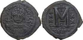 Justinian I (527-565). AE Follis. Theoupolis (Antioch) mint. Dated RY 33. Obv. Bust facing, helmeted, cuirassed, holding globus cruciger and shield. R...
