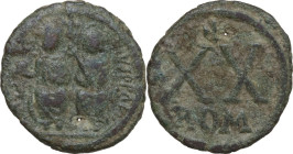 Justin II and Sofia (565-578). AE Half Follis, Rome mint. Obv. Justin and Sophia seated facing on double throne; the emperor holds globus cruciger, th...