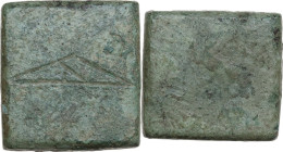 Byzantine Square Commercial Weight for 1 Ounce, 6th century. Obv. Engraved large Δ. Rev. Blank. Bendall -. AE. 25.92 g. VF.