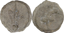 The Roman Empire. PB Tessera. D/ Anchor on globe (?). R/ Flower (?). PB. 9.85 g. 26.50 mm.