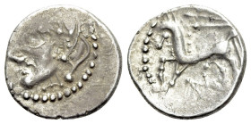 Central Gaul. Bituriges Cubi c. 70-50 BC. Quinarius AR (14mm, 1.94g, 6h). Celticized male head with thick locks to left. R/ Celticized horse prancing ...
