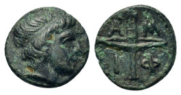 Macedon, Amphipolis, c. 410-357 BC. Æ Dichalkon (11mm, 0,90g.). Head of Apollo to right, wearing taenia. R/ A-M-Φ-I Lighted race torch, within linear ...