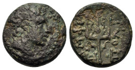 Macedon, Amphipolis, c. 187-168/7 BC. Æ (15,5mm, 4.00g). Head of the river-god Strymon right, wearing wreath of reeds. R/ ΑΜΦΙΠΟΛΙ Trident; monogram t...